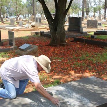 08. Photographer restoring an unclear inscription